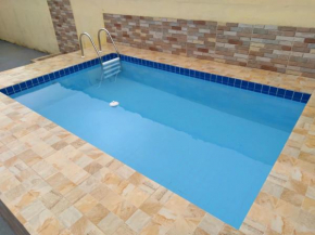 Casa em Condomínio com Piscina Privativa
